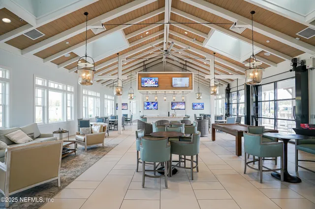 a view of an chairs and table in the patio