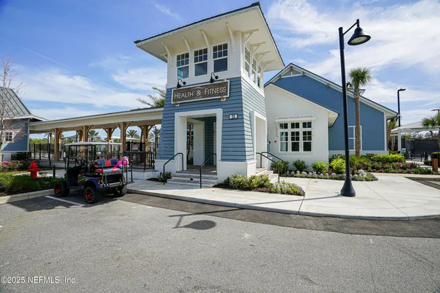 a view of a swimming pool with outdoor seating and lake