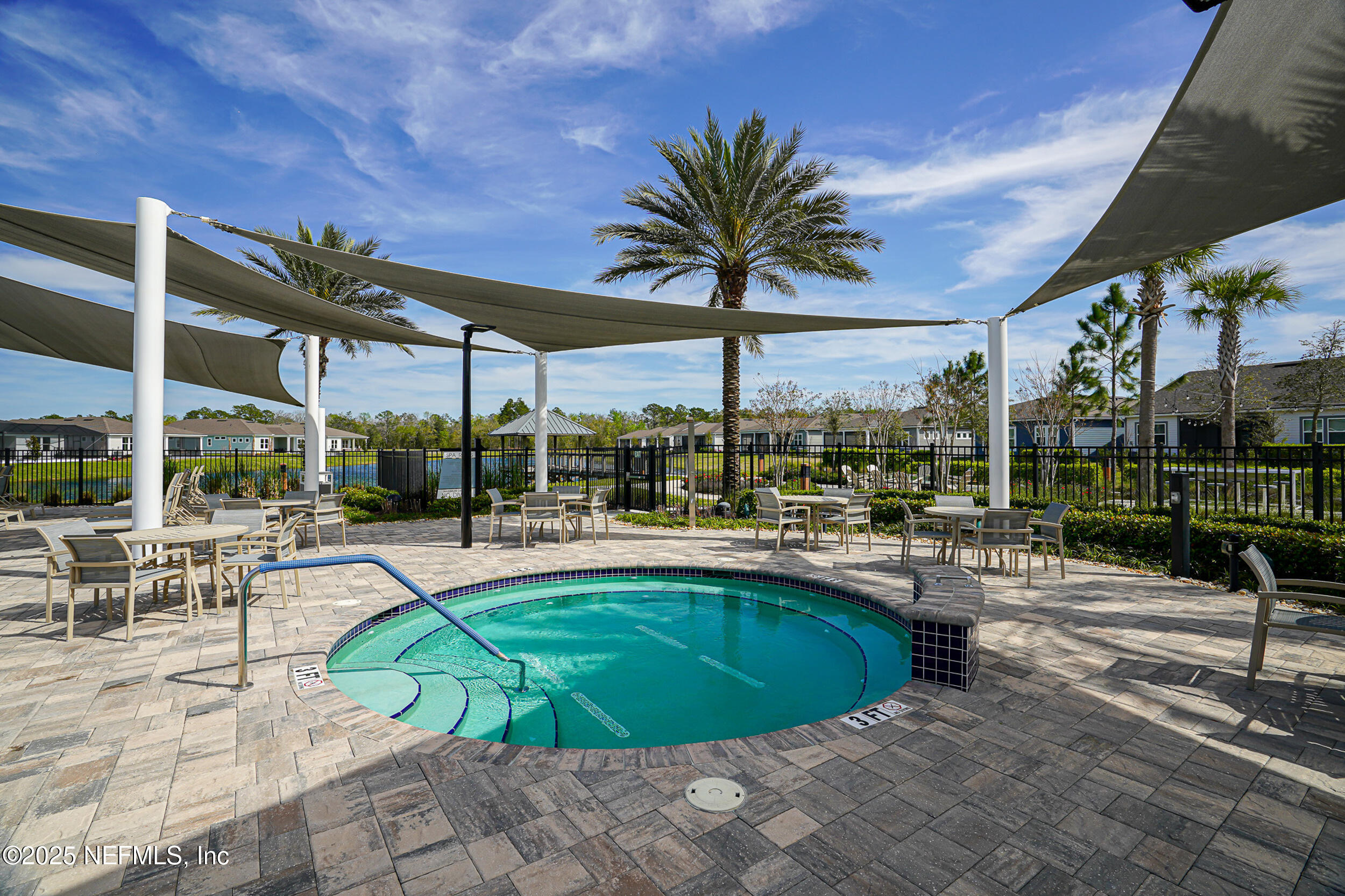 110 Fly Line Drive St. Johns, FL 32259 - Photo 40 of 65 a view of a swimming pool with chairs in patio