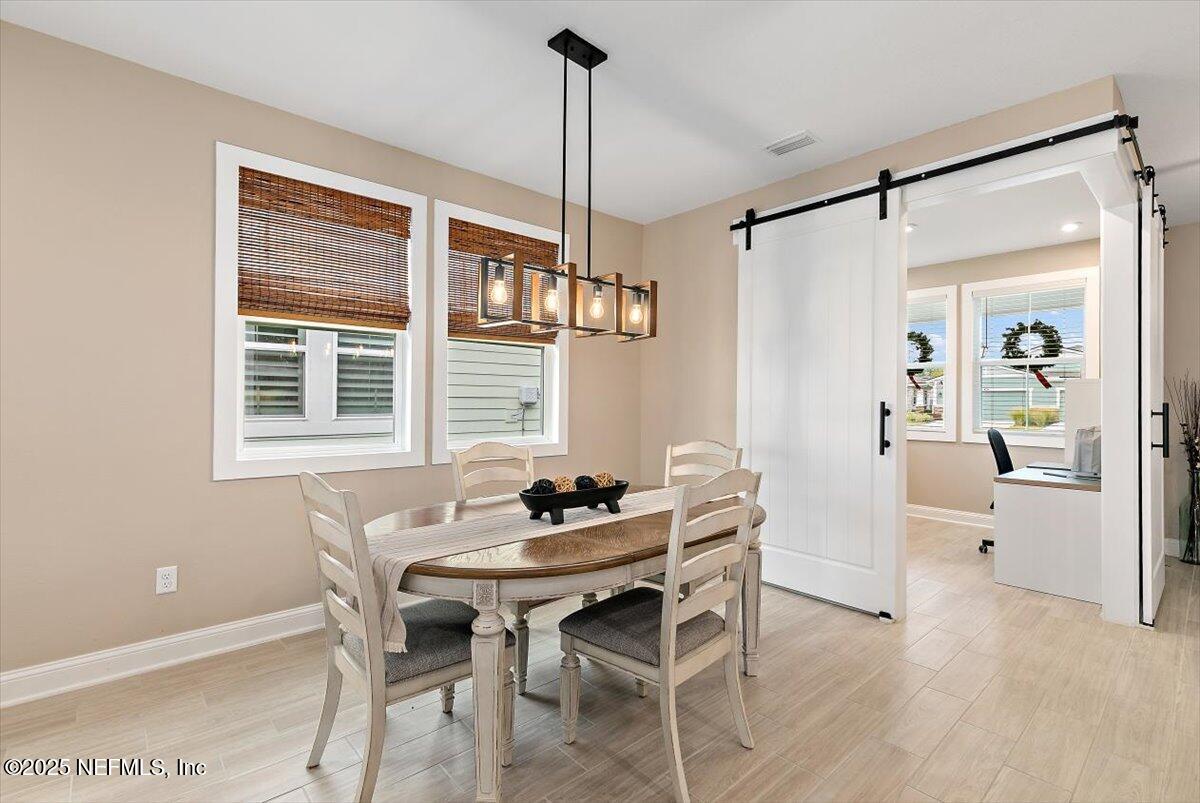 110 Fly Line Drive St. Johns, FL 32259 - Photo 10 of 65 a dining room with furniture and window