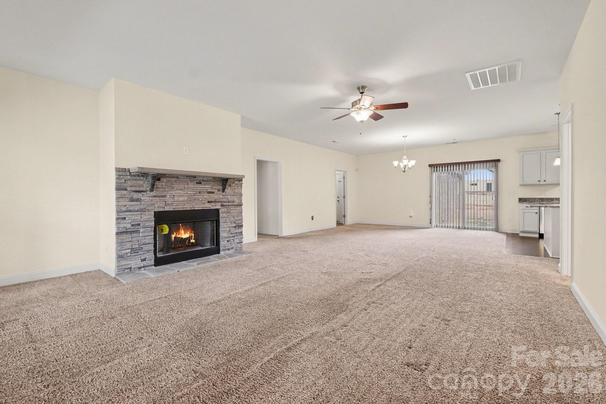 175 Cox Lake Road Stanley, NC 28164 - Photo 23 of 45 a view of empty room with a fireplace