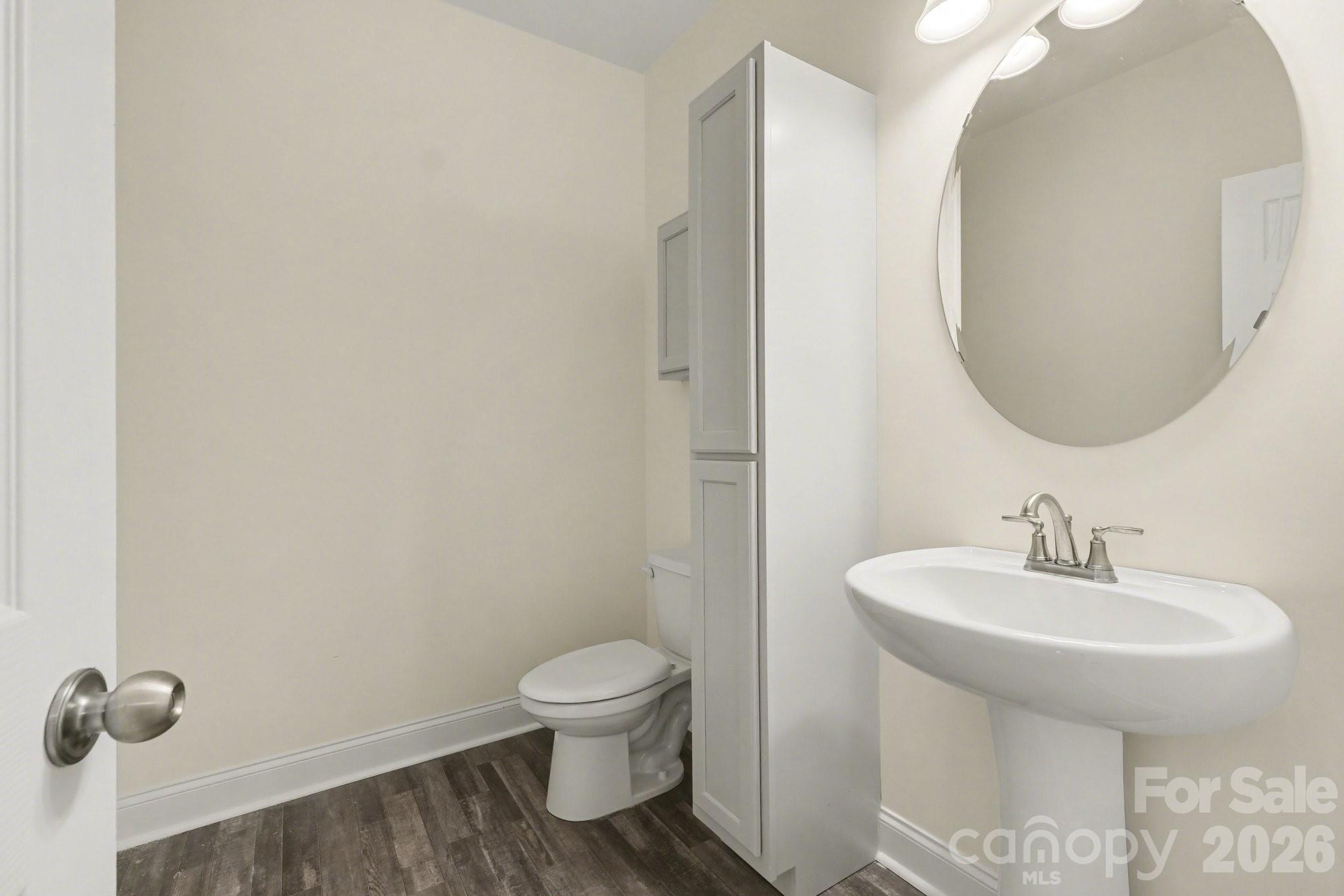 175 Cox Lake Road Stanley, NC 28164 - Photo 24 of 45 a bathroom with a sink toilet and a mirror