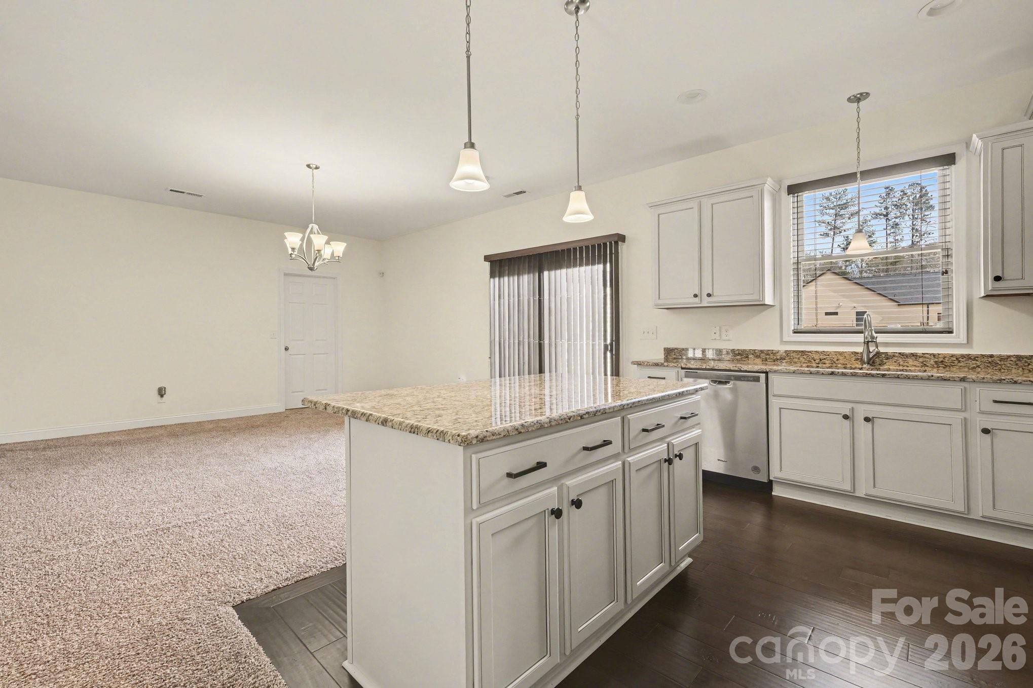 175 Cox Lake Road Stanley, NC 28164 - Photo 35 of 45 a kitchen with a sink stove and cabinets
