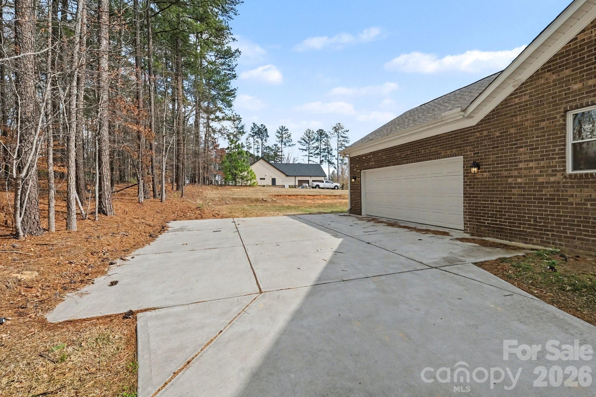 175 Cox Lake Road Stanley, NC 28164 - Photo 40 of 45 a view of a backyard space