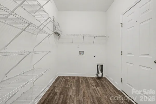 a view of a room with racks on the wall