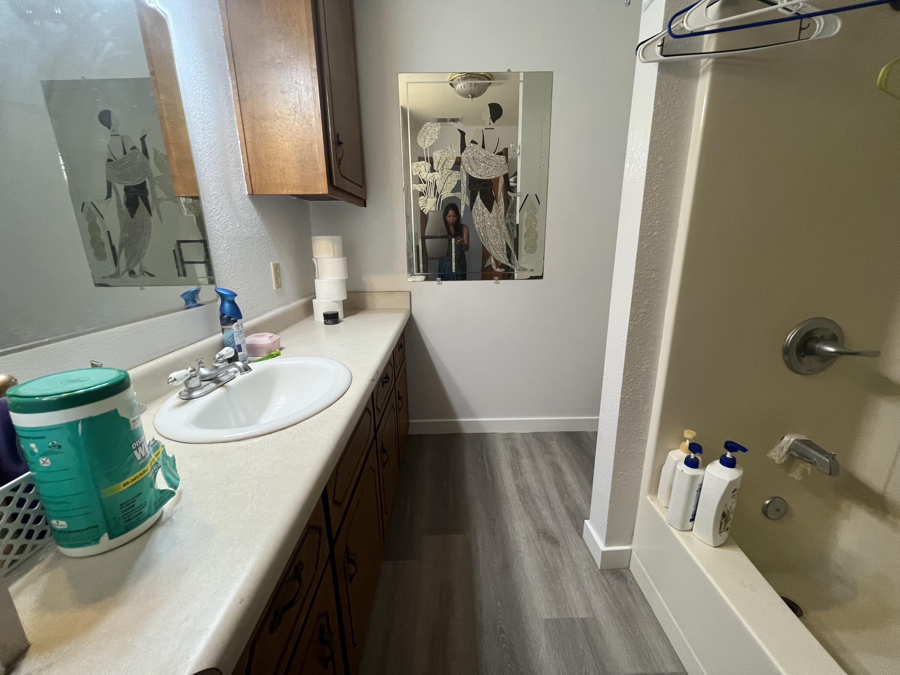 2713 Woodson Avenue Corning, CA 96021 - Photo 17 of 38 a bathroom with a sink and a mirror