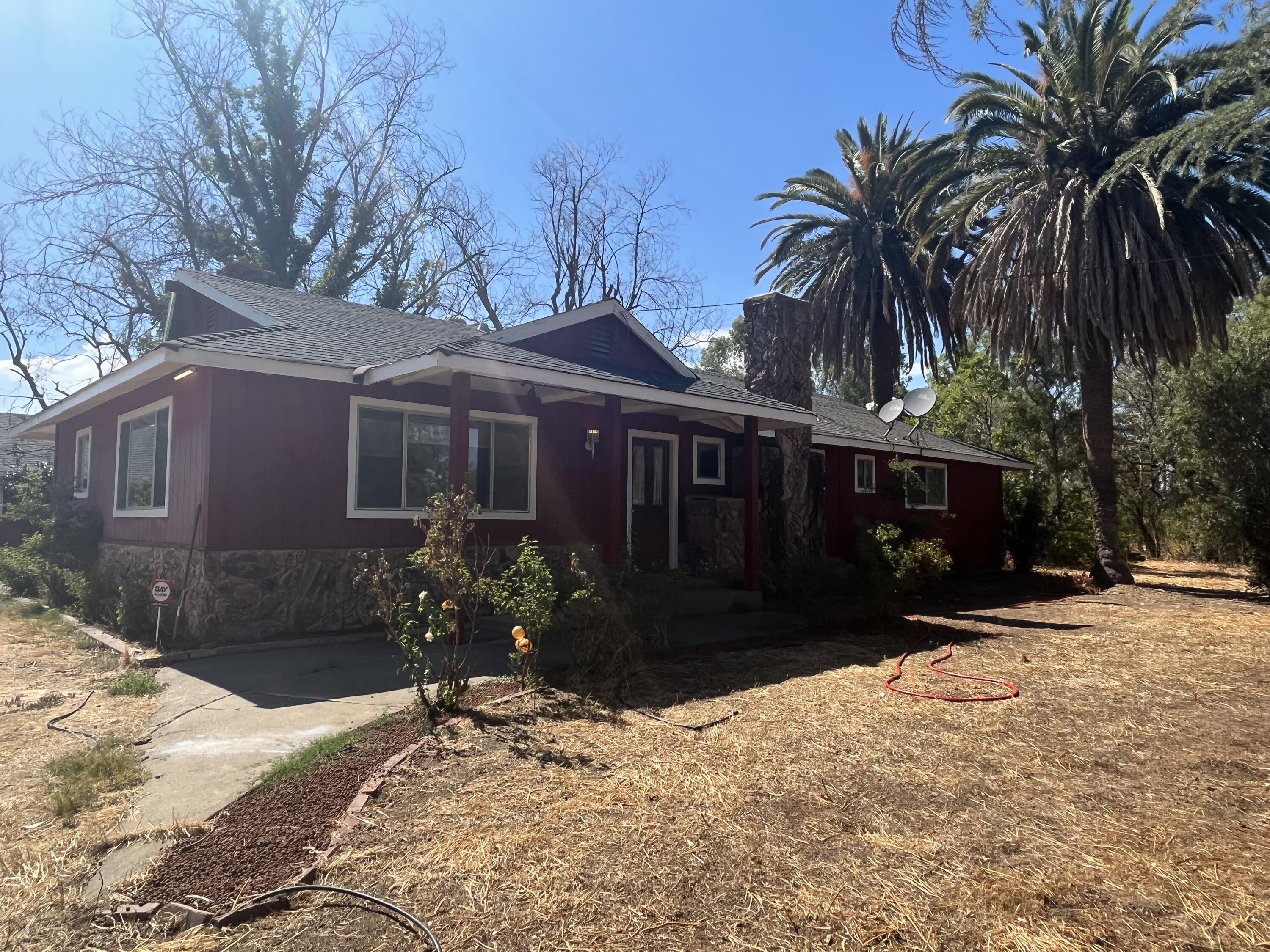 2713 Woodson Avenue Corning, CA 96021 - Photo 2 of 38 a view of a house with a yard covered with snow