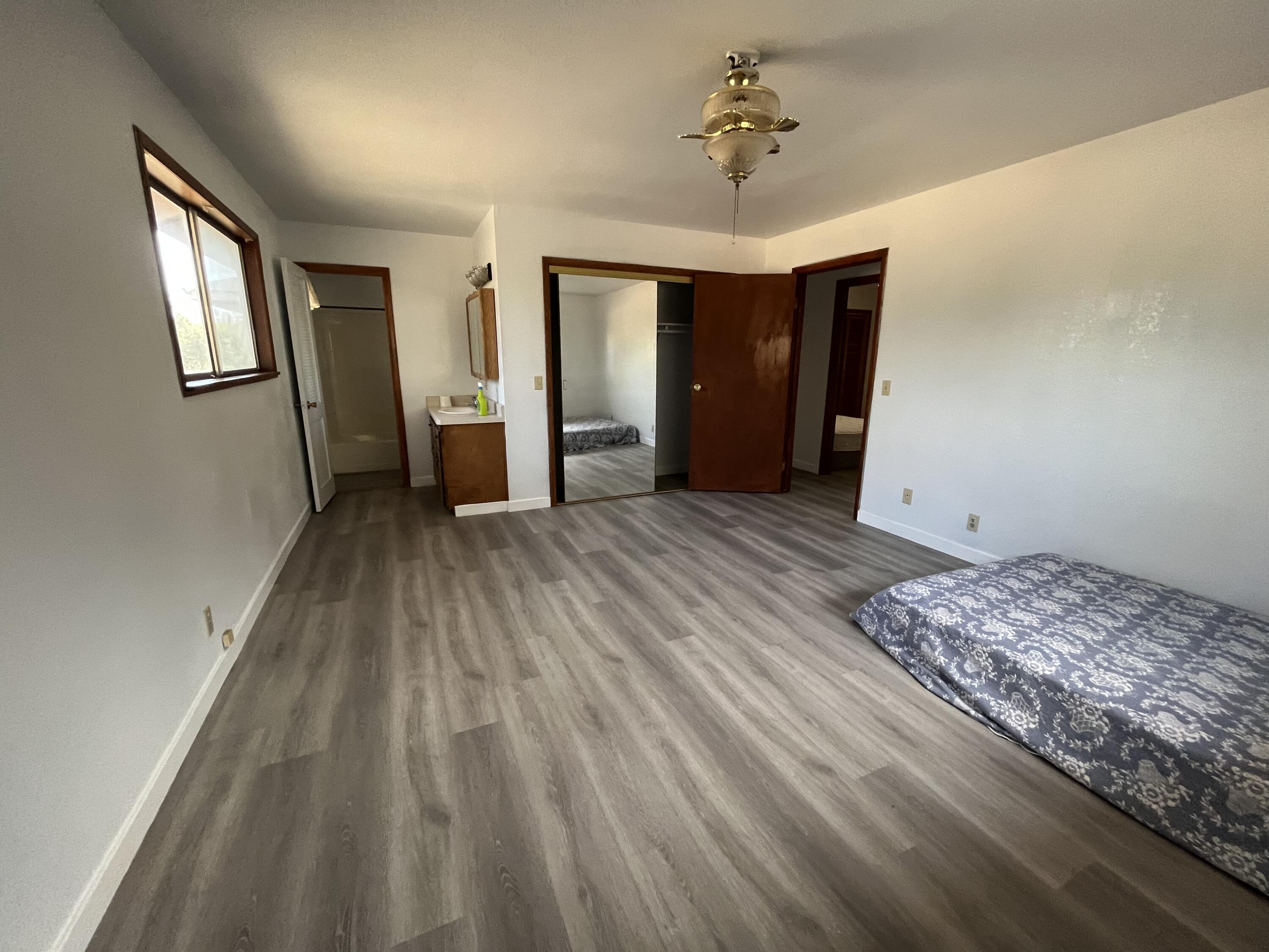 2713 Woodson Avenue Corning, CA 96021 - Photo 10 of 38 a view of livingroom with hardwood floor and ceiling fan