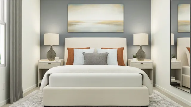 a bedroom with a bed and chandelier