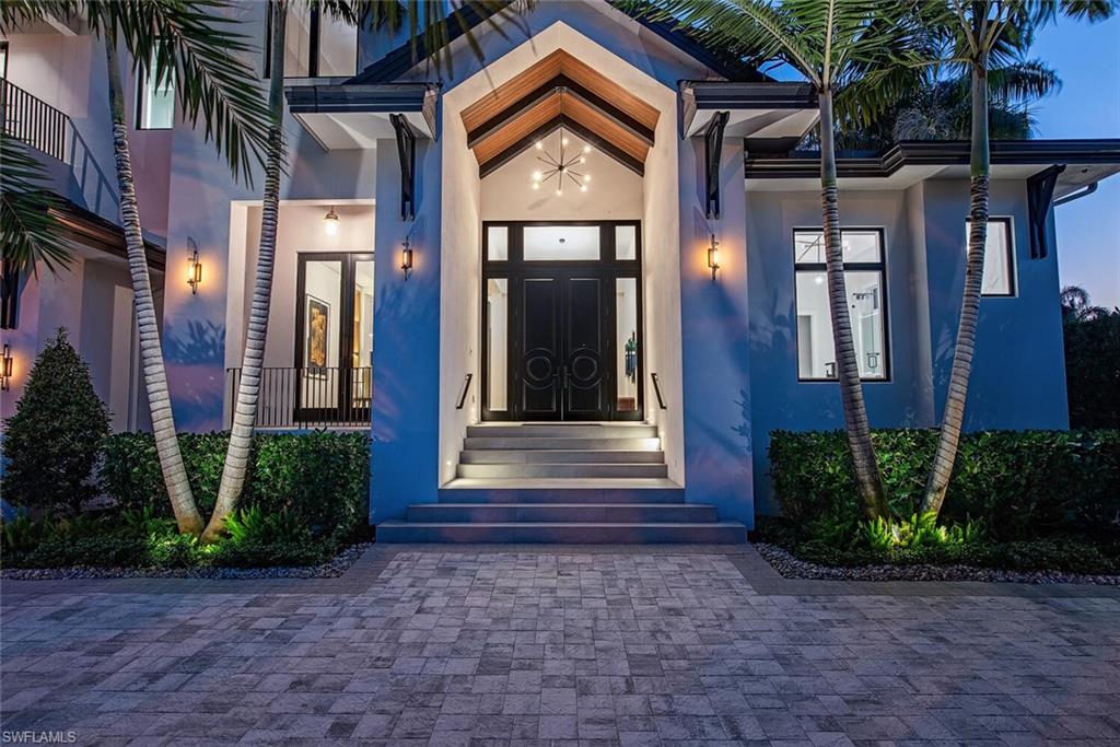 608 16th Avenue South Naples, FL 34102 - Photo 2 of 36 a front view of a house