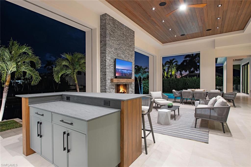 608 16th Avenue South Naples, FL 34102 - Photo 23 of 36 a view of kitchen with furniture and window