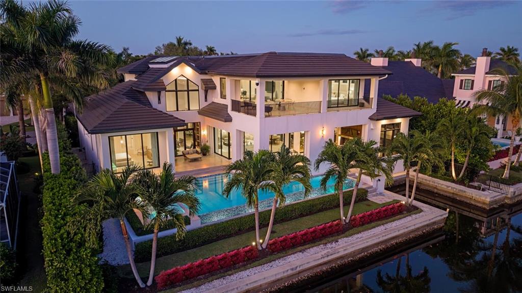 608 16th Avenue South Naples, FL 34102 - Photo 31 of 36 a front view of a house with a yard