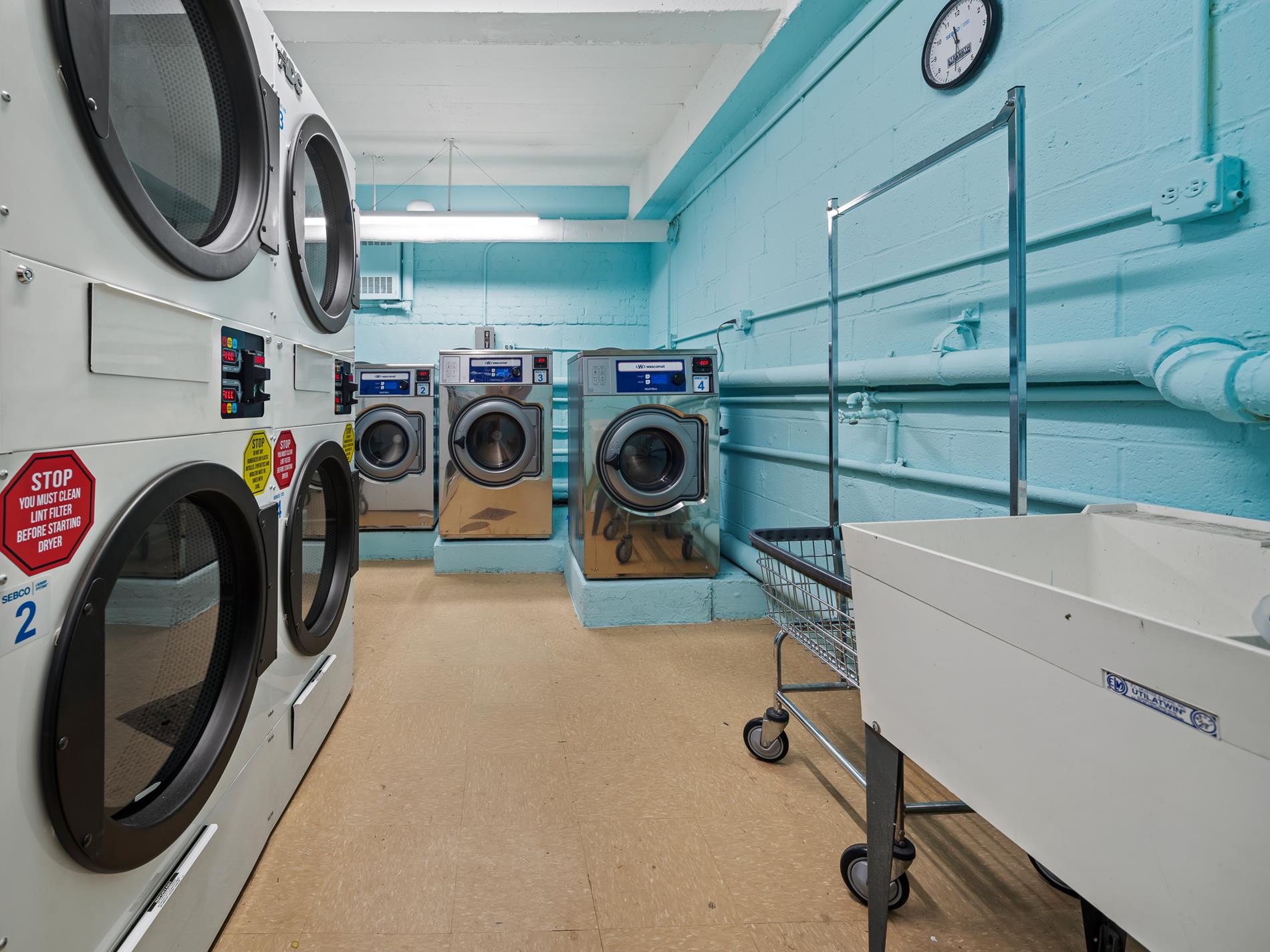 6665 Colonial Road, Unit 5D Brooklyn, NY 11220 - Photo 13 of 18 a utility room with dryer and washer