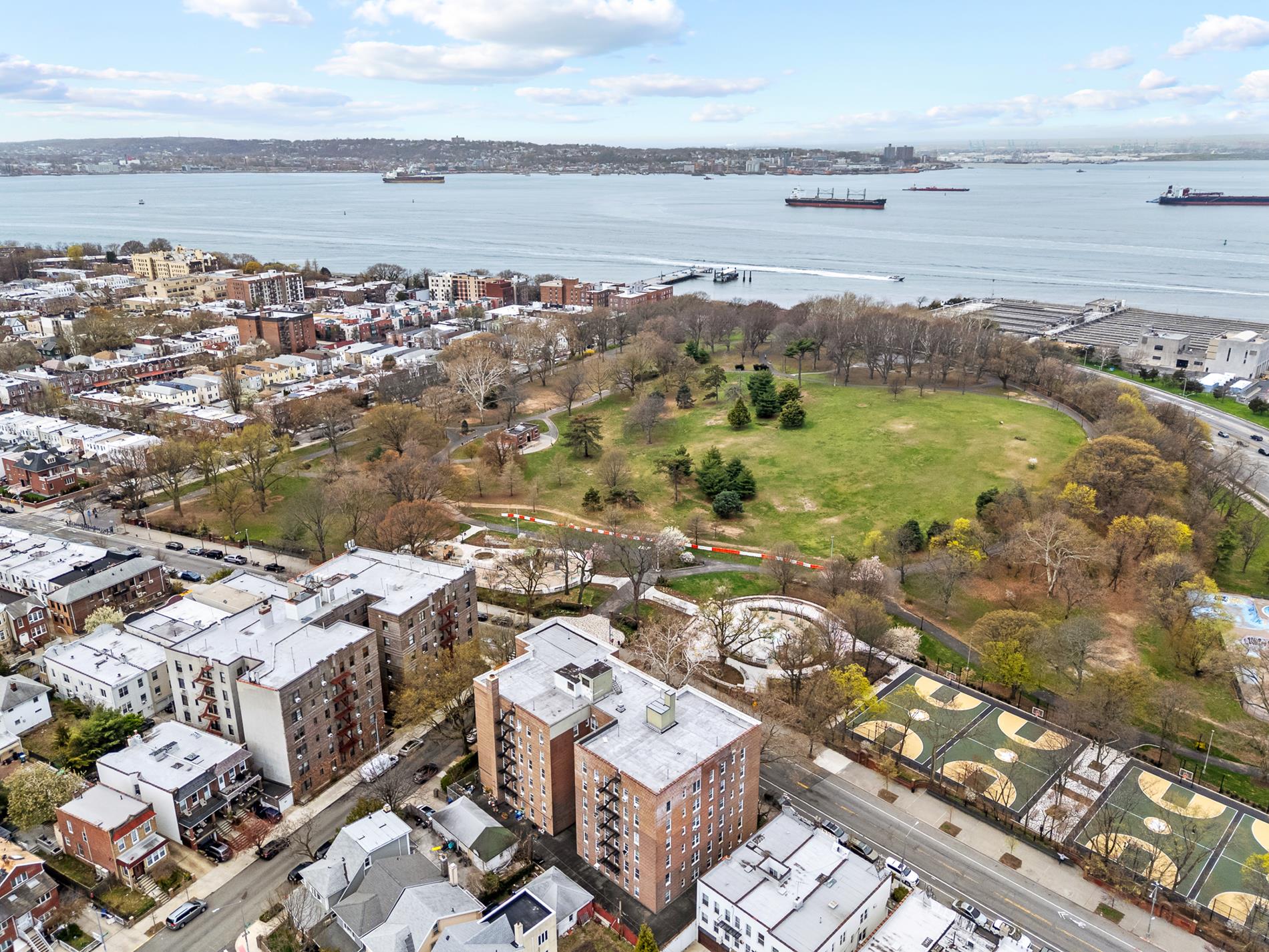 6665 Colonial Road, Unit 5D Brooklyn, NY 11220 - Photo 15 of 18 an aerial view of a city with ocean view