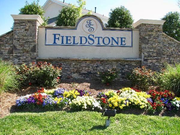 974 Copperstone Lane Fort Mill, SC 29708 - Photo 1 of 22 a view of sign board with flowers