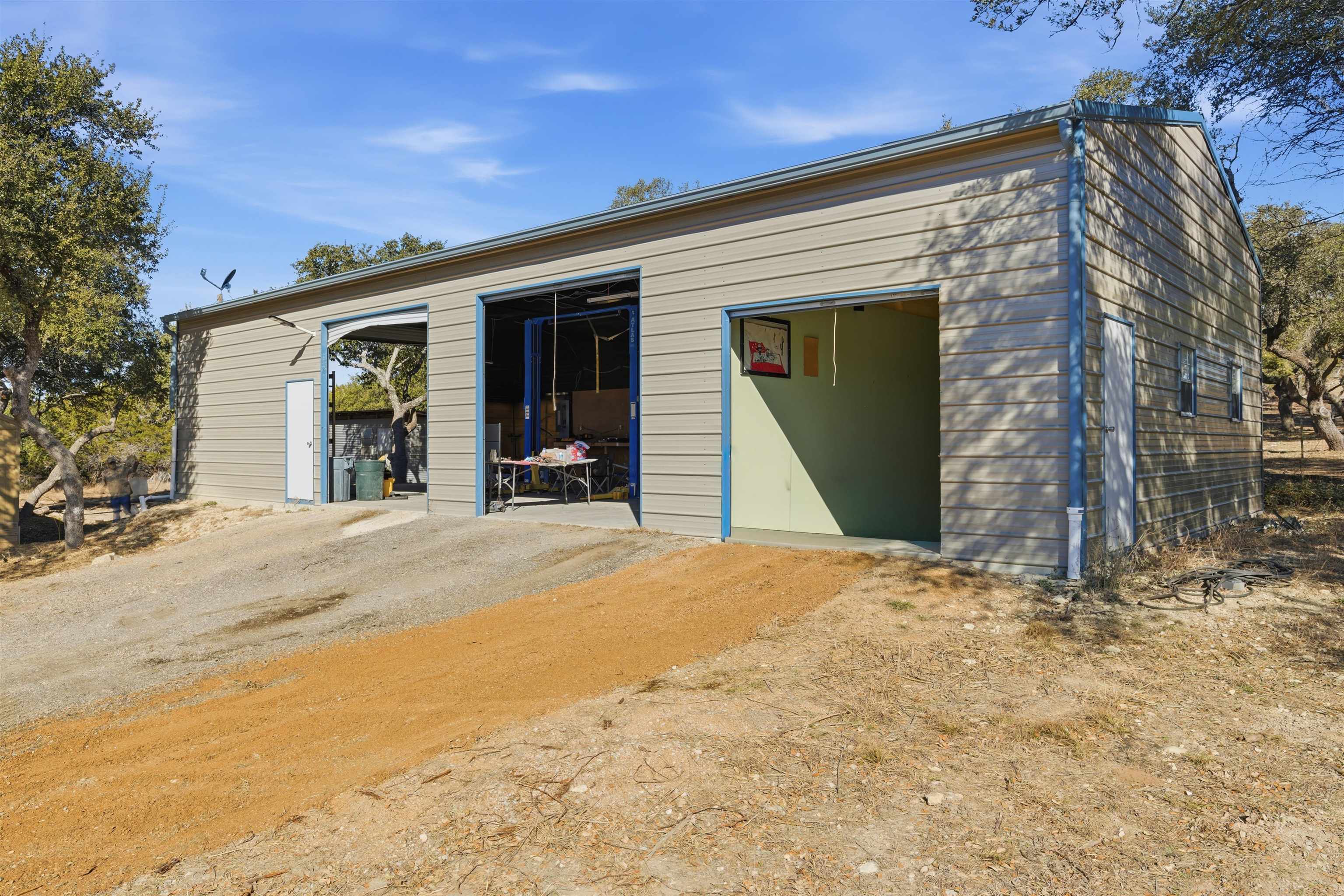 418 Polvado Round Mountain, TX 78663 - Photo 6 of 26 front view of a house