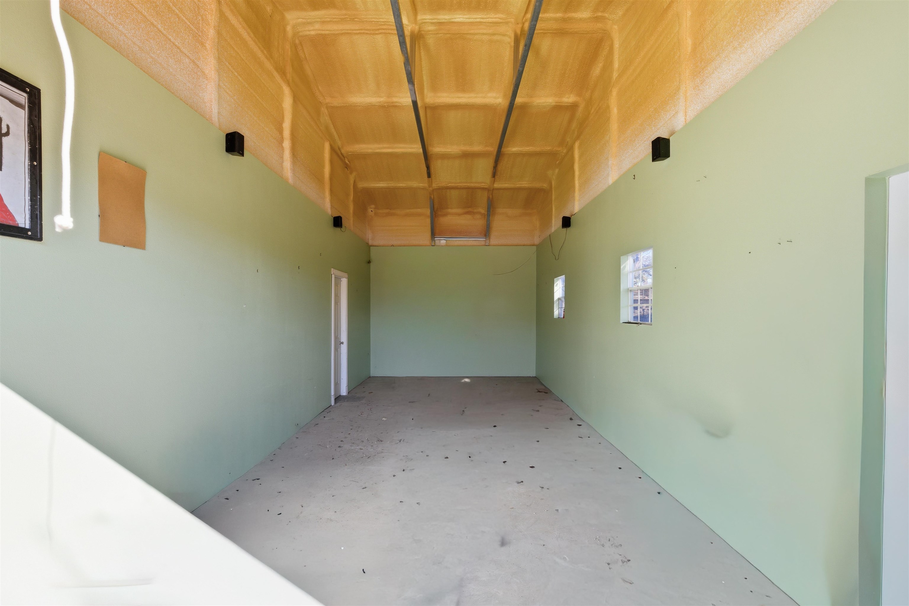 418 Polvado Round Mountain, TX 78663 - Photo 9 of 26 a view of a big room with windows
