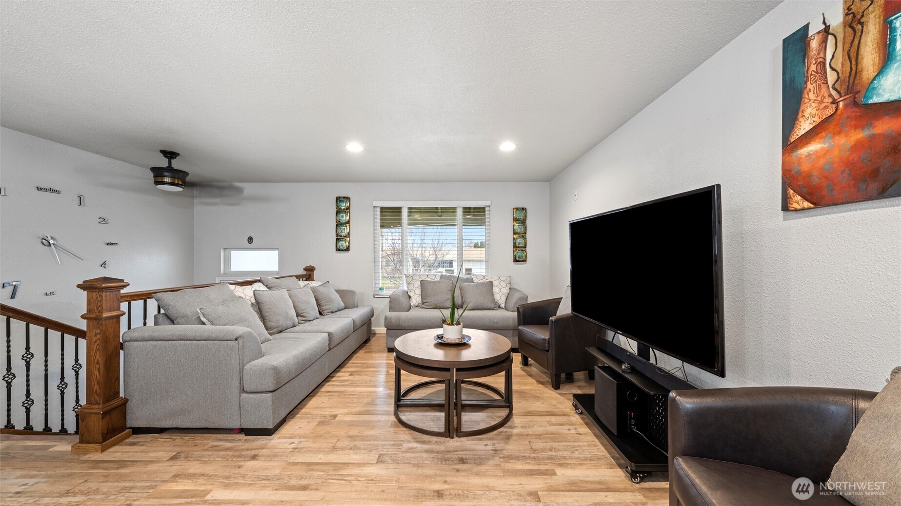 321 South Sheppard Street Kennewick, WA 99336 - Photo 4 of 22 a living room with furniture and a flat screen tv