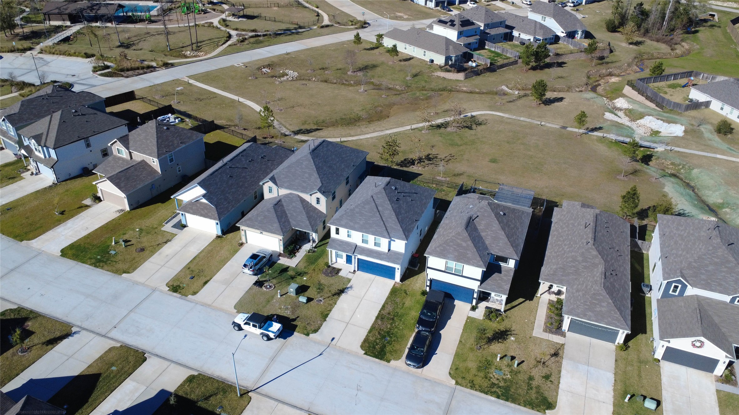 2522 Sturgeon Way Conroe, TX 77384 - Photo 2 of 19 an aerial view of houses with outdoor space