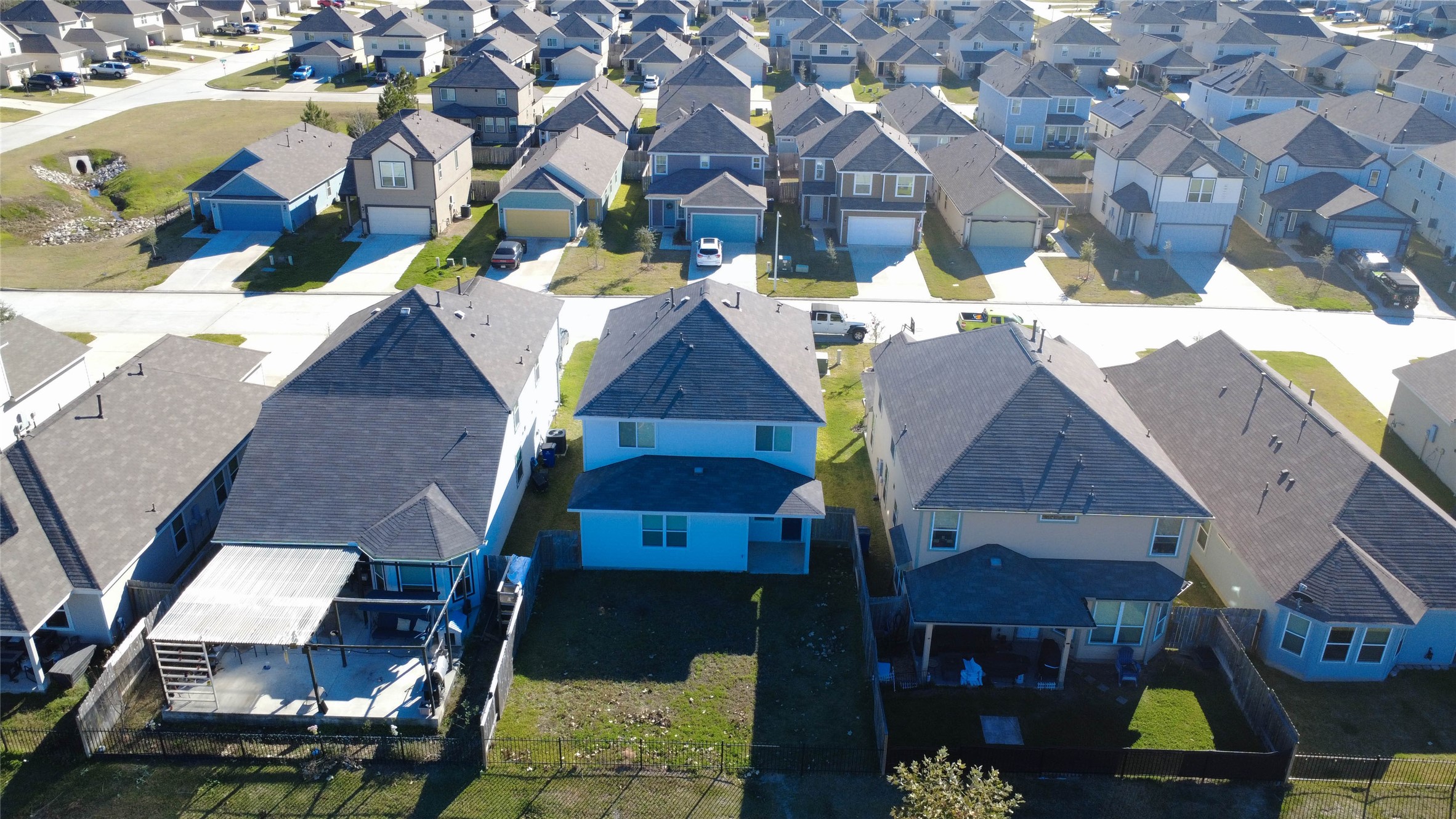 2522 Sturgeon Way Conroe, TX 77384 - Photo 4 of 19 an aerial view of houses with wooden stairs