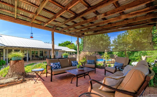 a outdoor living space with furniture and garden view