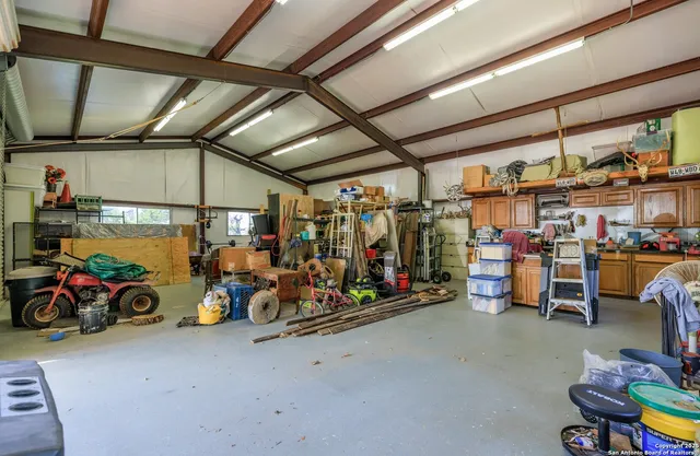 a view of a storage room with racks