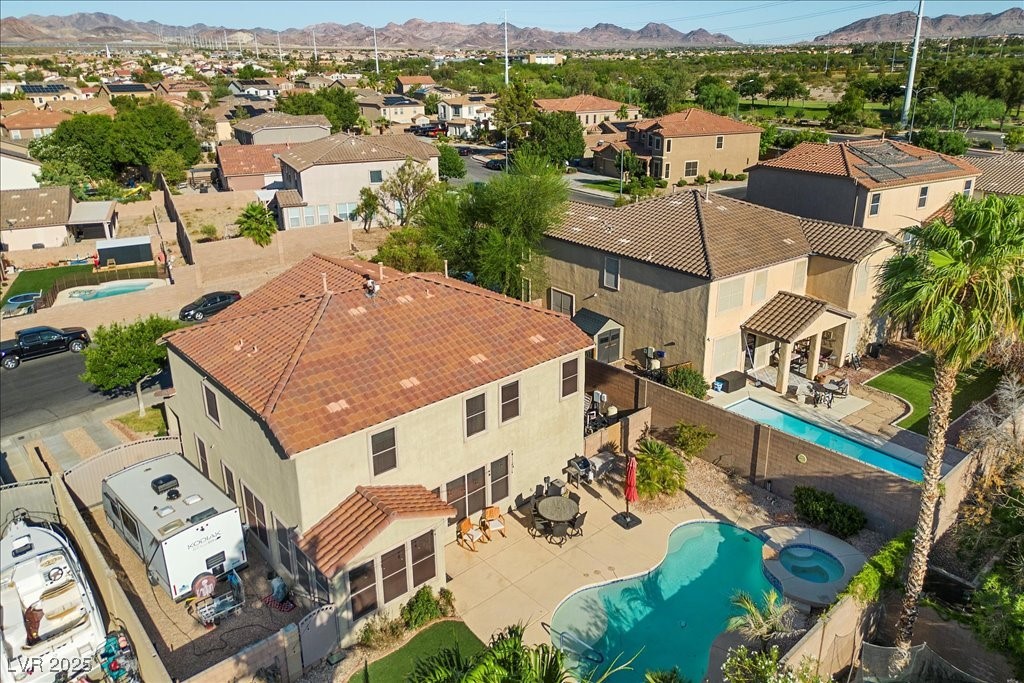 249 Cinnamon Ridge Way Henderson, NV 89015 - Photo 65 of 76 Aerial view of residential area with mountains