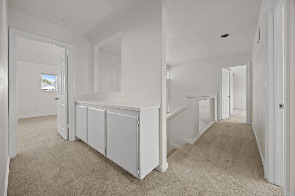 4595 Blackwell Road Oceanside, CA 92056 - Photo 31 of 47 a view of a room with white walls