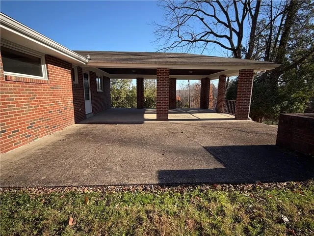 a front view of a house with porch