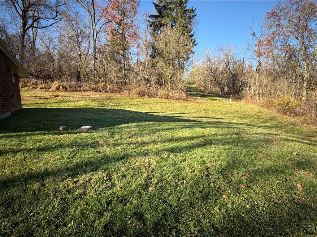 123 B Hidden Valley Road Canonsburg, PA 15317 - Photo 4 of 20 a view of a yard with large trees