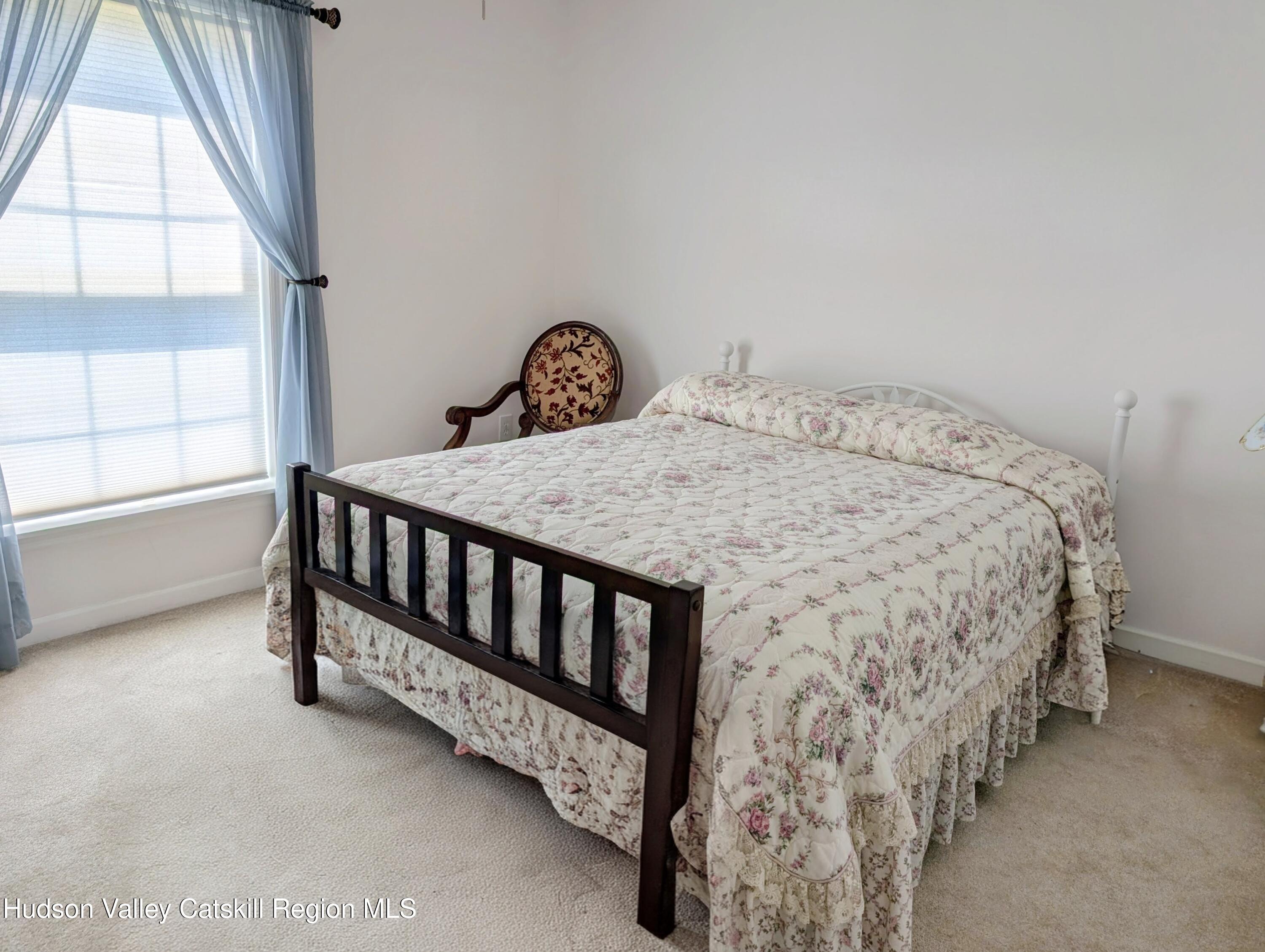 834 Co Rte 19 Elizaville, NY 12523 - Photo 12 of 32 a bedroom with a bed and window