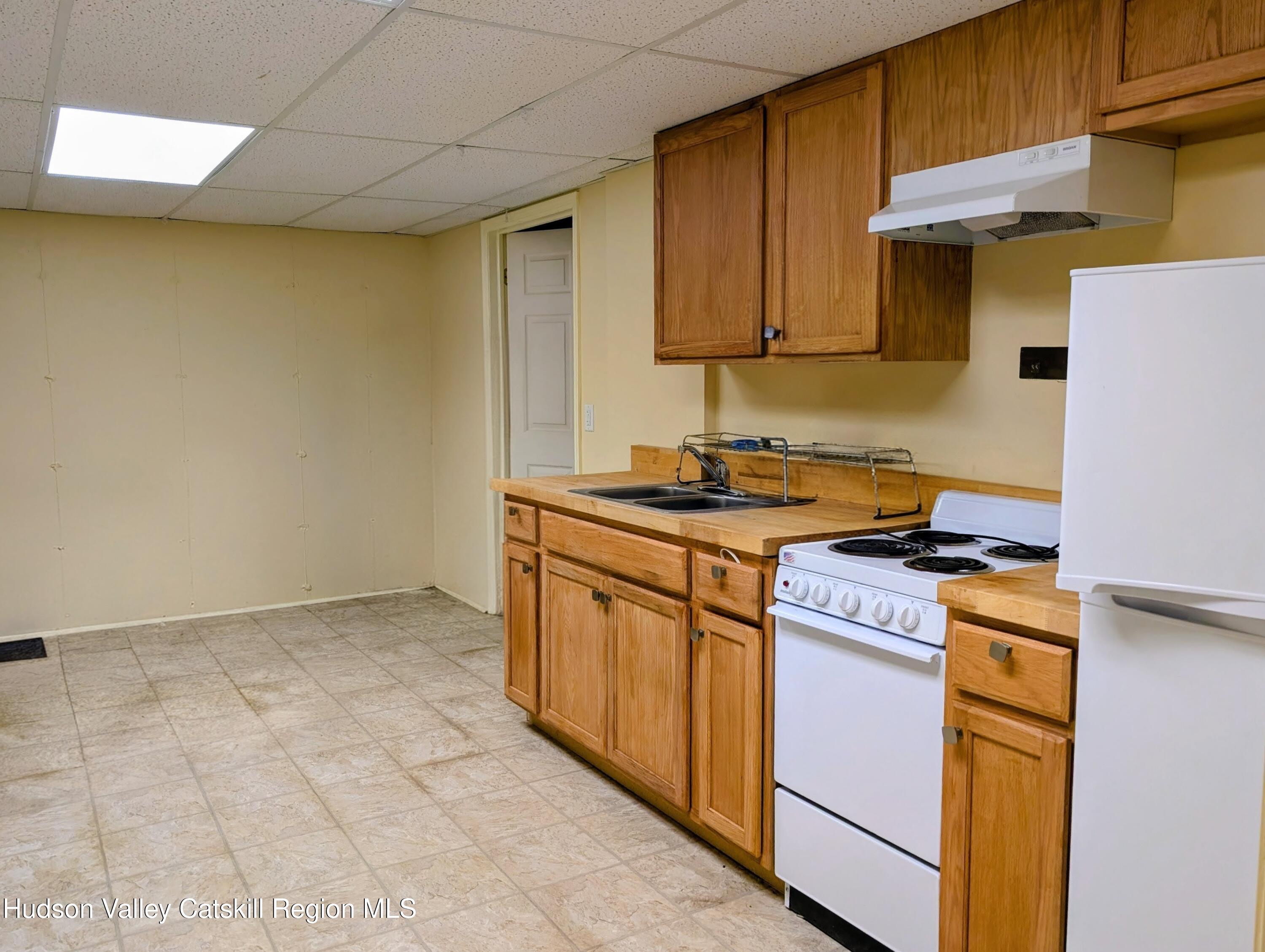 834 Co Rte 19 Elizaville, NY 12523 - Photo 14 of 32 a kitchen with stainless steel appliances granite countertop a stove a sink and a microwave
