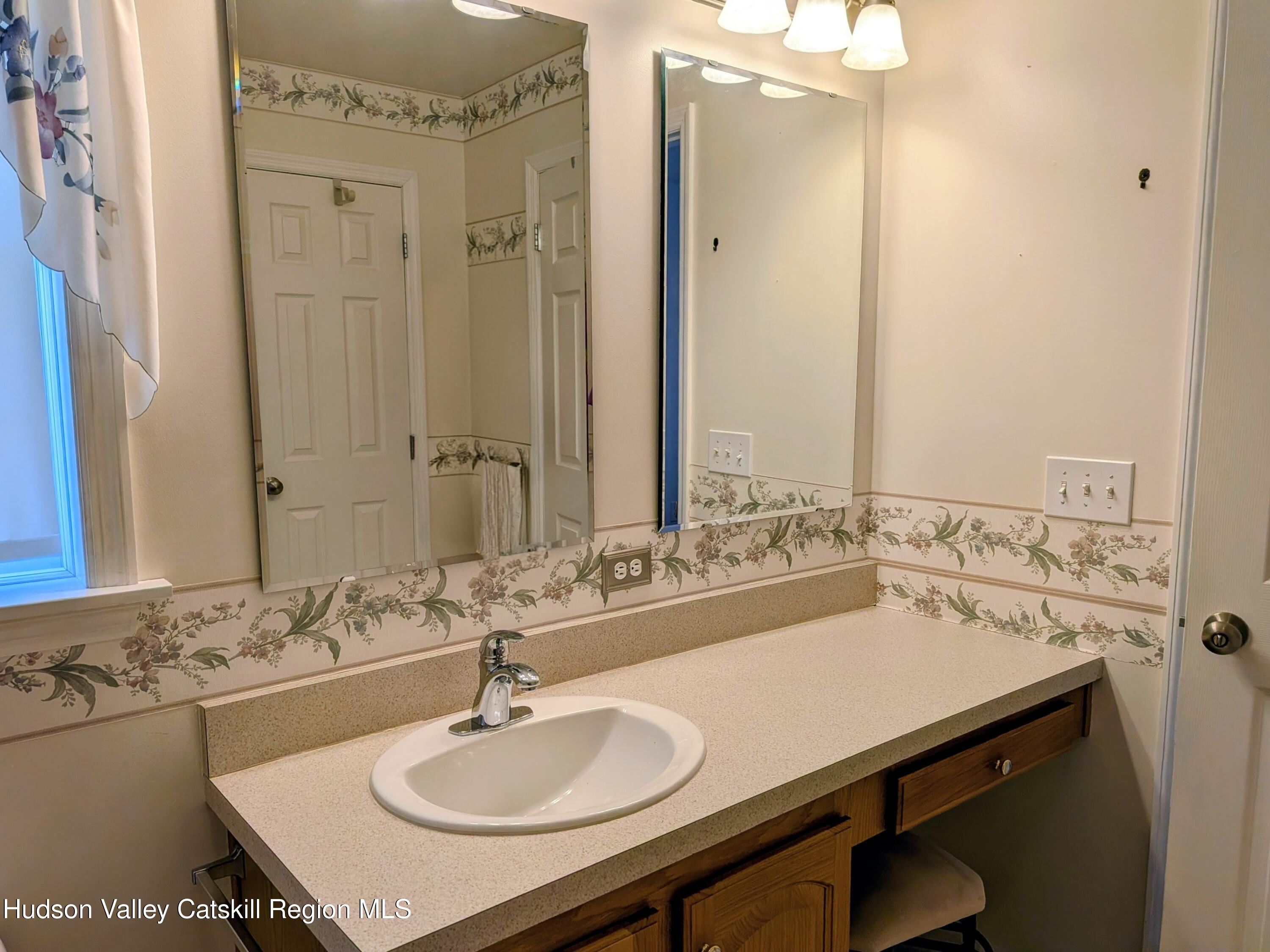 834 Co Rte 19 Elizaville, NY 12523 - Photo 22 of 32 a bathroom with a sink and a mirror