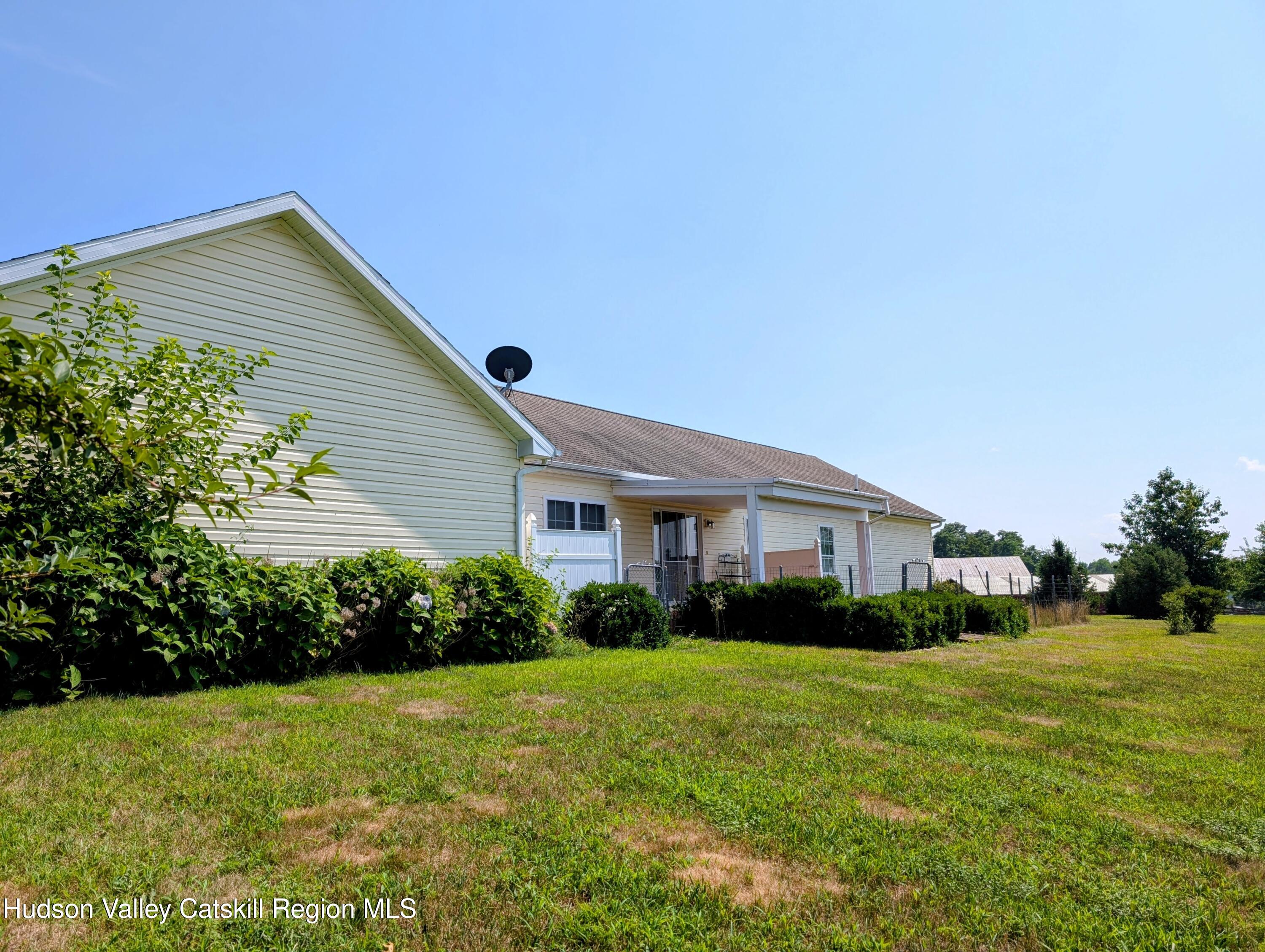 834 Co Rte 19 Elizaville, NY 12523 - Photo 26 of 32 a front view of house with yard and green space