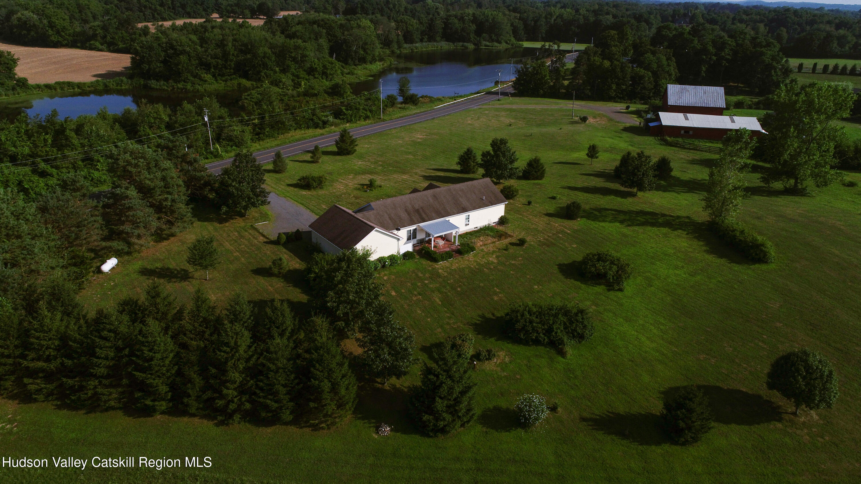 834 Co Rte 19 Elizaville, NY 12523 - Photo 29 of 32 a garden view with a sitting space