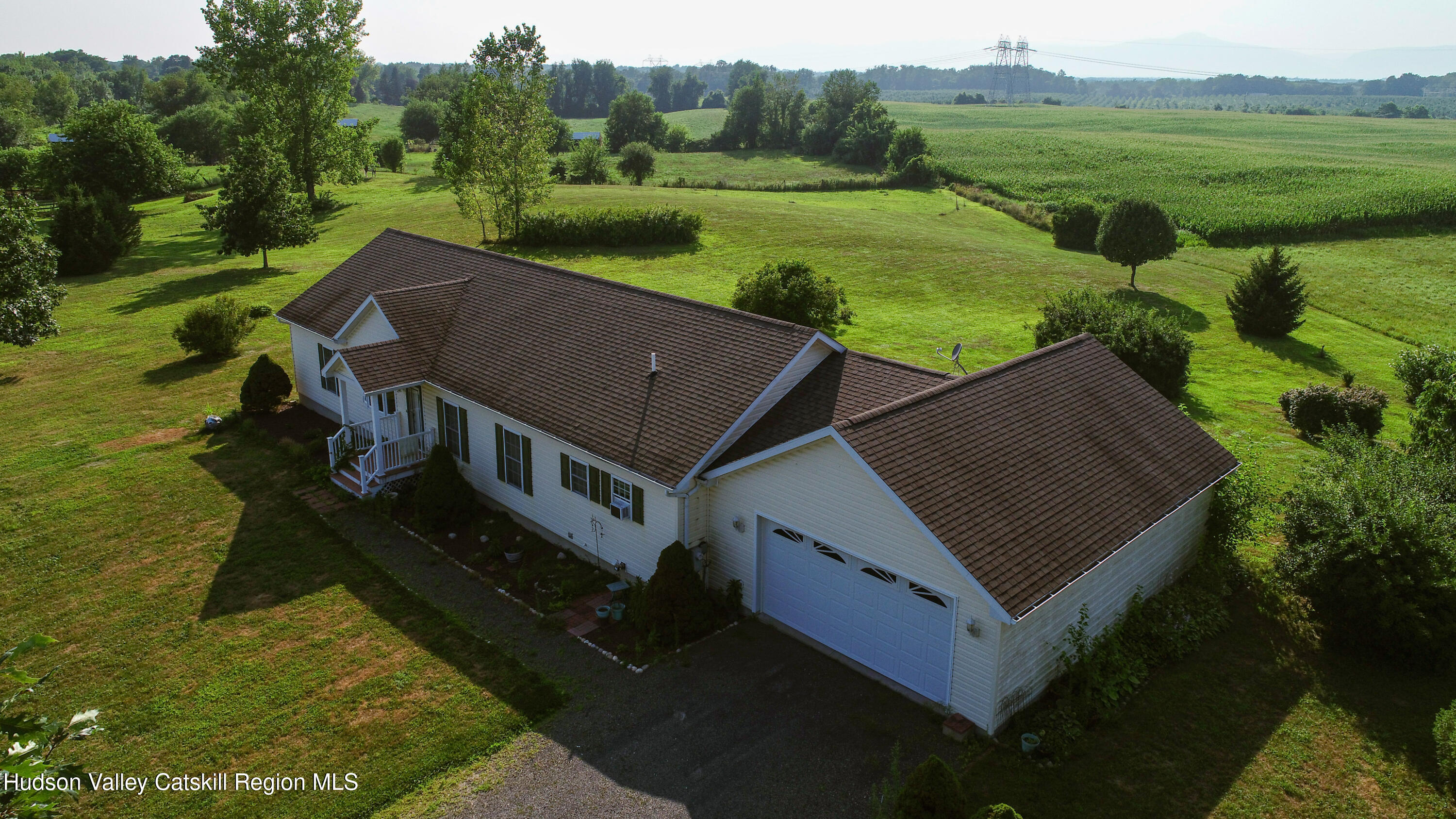 834 Co Rte 19 Elizaville, NY 12523 - Photo 32 of 32 an aerial view of a house with pool and a yard