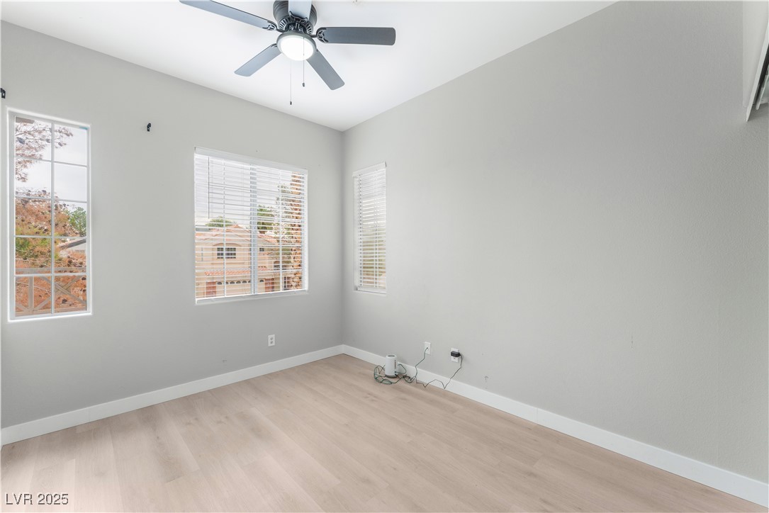 3695 Funston Way Las Vegas, NV 89129 - Photo 35 of 43 Spare room with light wood finished floors and a ceiling fan