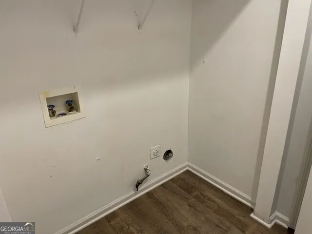 a view of a patio with couple of chairs