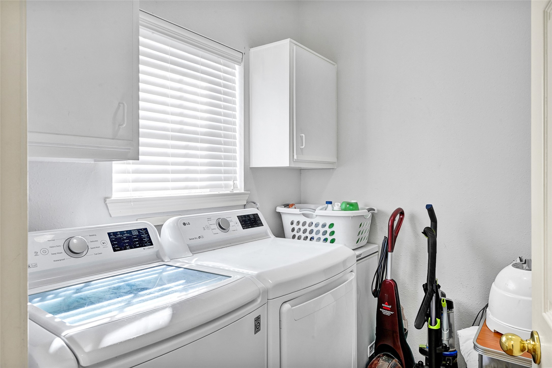 10100 Spring Pl Drive Houston, TX 77070 - Photo 11 of 24 Dedicated utility room with extra space for storage and organization.