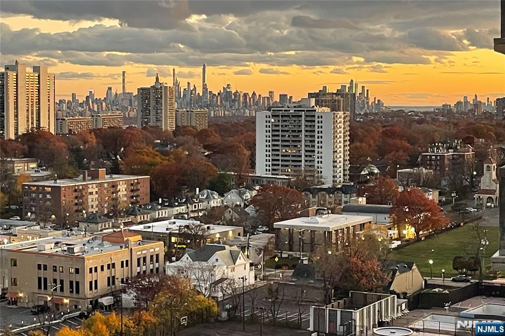 a view of a city with tall buildings
