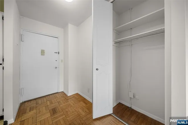 a bathroom with a sink a mirror and a toilet