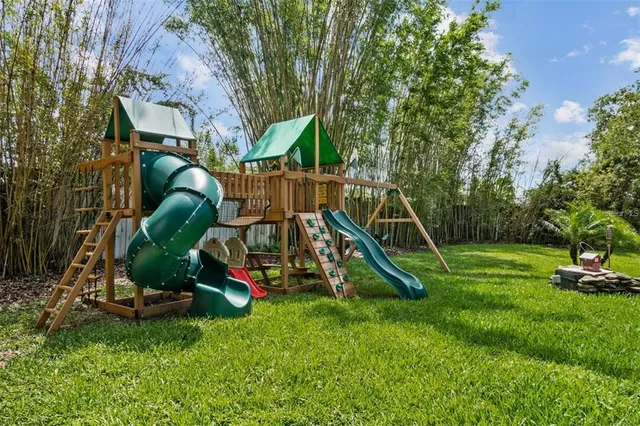 a view of a park with a slide