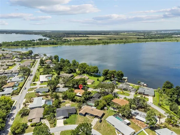 a view of a lake with a city