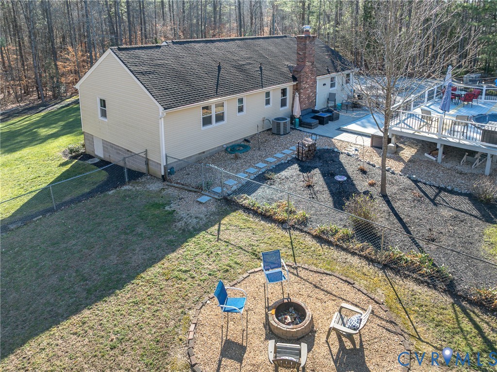 20903 Matoaca Road Petersburg, VA 23803 - Photo 25 of 42 a view of a backyard with chairs and table