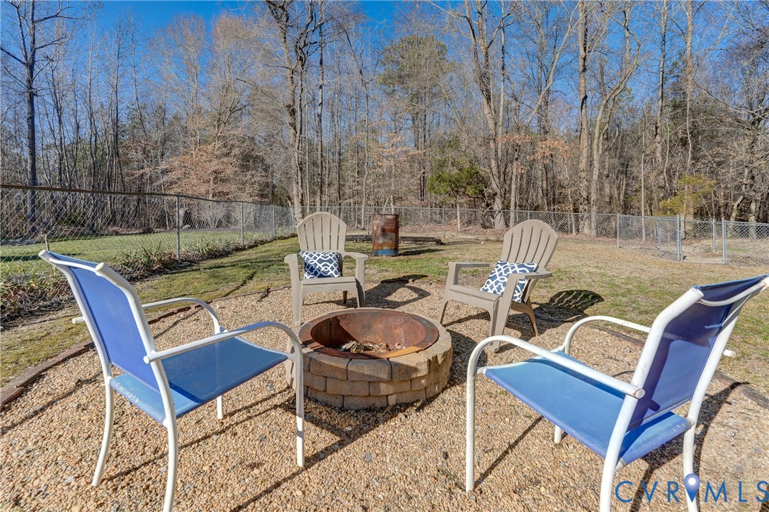 20903 Matoaca Road Petersburg, VA 23803 - Photo 35 of 42 a view of a chairs and table in patio