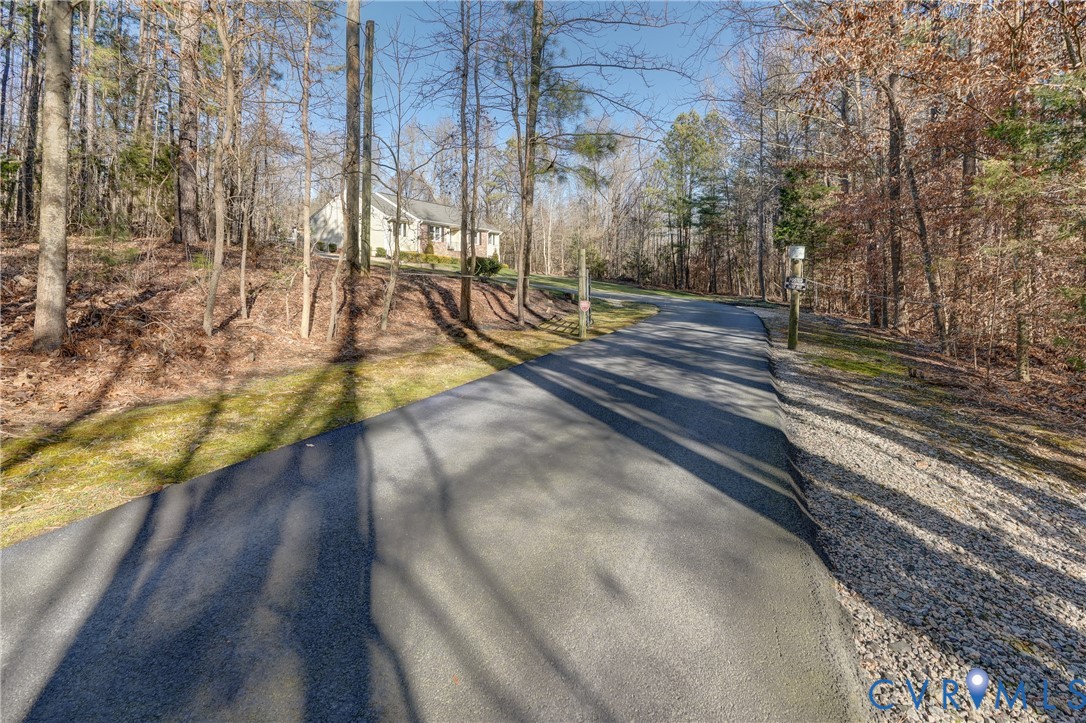 20903 Matoaca Road Petersburg, VA 23803 - Photo 36 of 42 a view of a yard with wooden fence