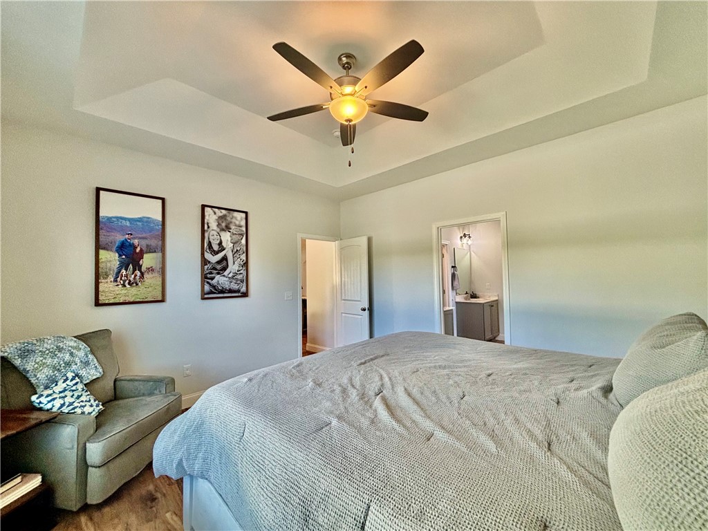 248 Inlet Pointe Drive Anderson, SC 29625 - Photo 16 of 42 This serene bedroom offers a tranquil retreat with ample natural light.