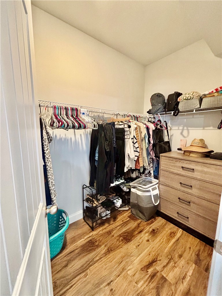 248 Inlet Pointe Drive Anderson, SC 29625 - Photo 20 of 42 This ample primary walk-in closet offers extensive storage and durable flooring.