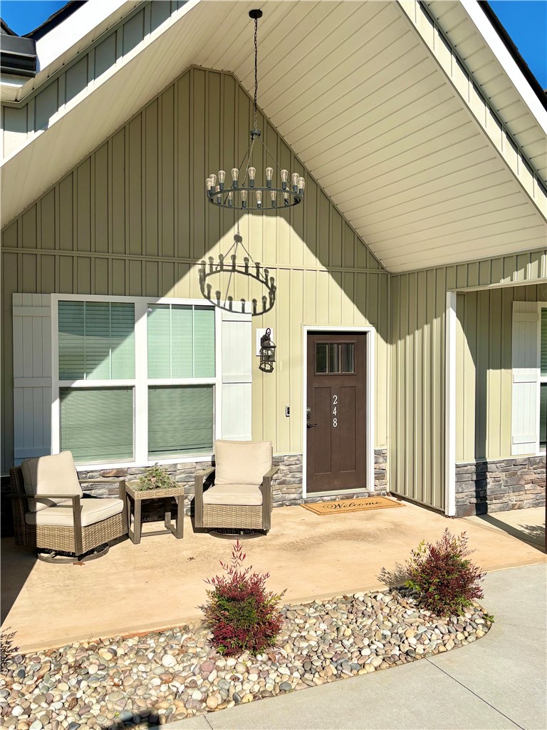 248 Inlet Pointe Drive Anderson, SC 29625 - Photo 2 of 42 This inviting entrance features a gorgeous Wagon Wheel Chandelier that will wow your guests.
