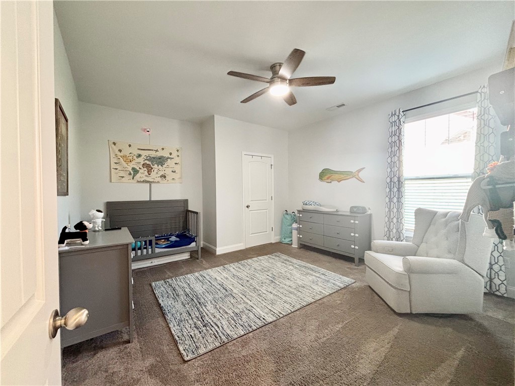 248 Inlet Pointe Drive Anderson, SC 29625 - Photo 23 of 42 This cozy 3rd bedroom offers a comfortable and inviting atmosphere for peaceful rest and relaxation.